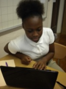 Orriyonna Willis is working with her partner in class to create a website for learning website publishing skills.